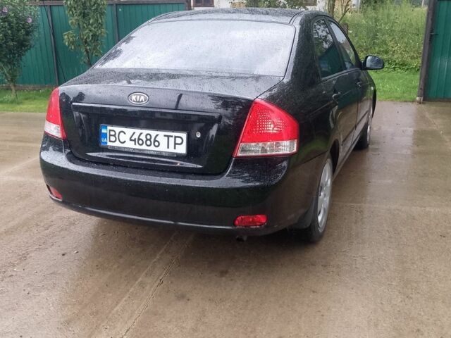 Черный Киа Черато, объемом двигателя 1.6 л и пробегом 208 тыс. км за 4700 $, фото 4 на Automoto.ua