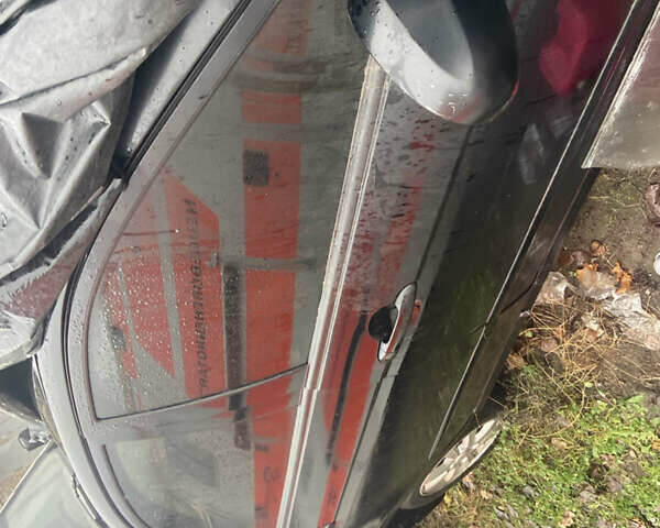 Черный Киа Черато, объемом двигателя 1.98 л и пробегом 95 тыс. км за 1650 $, фото 2 на Automoto.ua