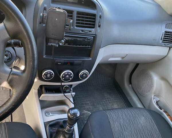 Чорний Кіа Черато, об'ємом двигуна 1.6 л та пробігом 210 тис. км за 4700 $, фото 12 на Automoto.ua