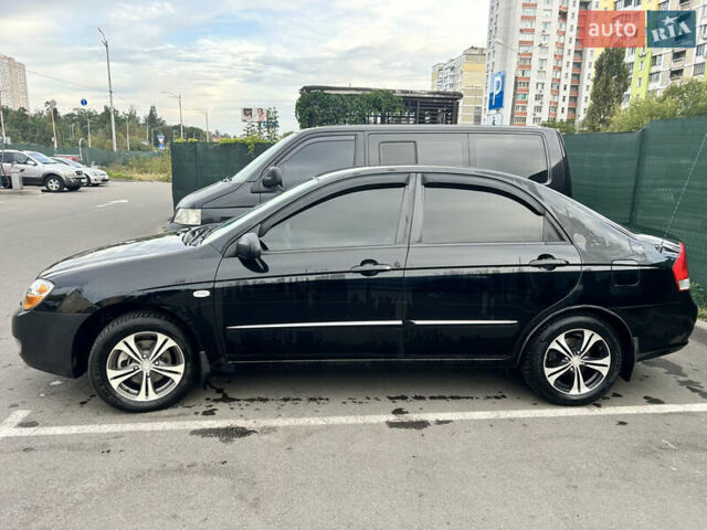 Черный Киа Черато, объемом двигателя 1.58 л и пробегом 350 тыс. км за 4500 $, фото 10 на Automoto.ua