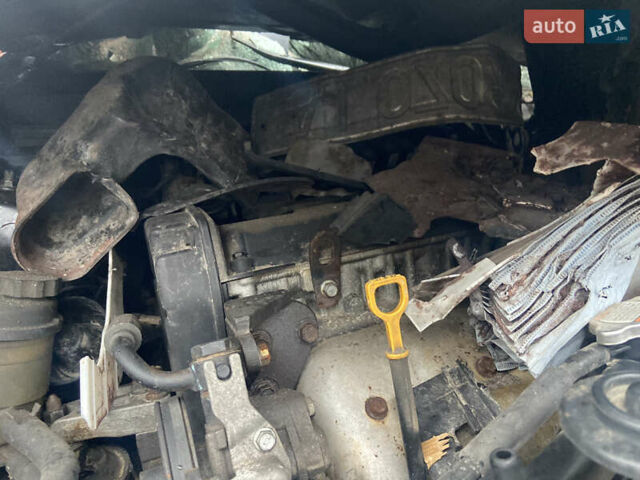 Черный Киа Черато, объемом двигателя 1.98 л и пробегом 95 тыс. км за 1650 $, фото 3 на Automoto.ua