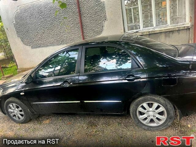 Чорний Кіа Черато, об'ємом двигуна 1.6 л та пробігом 330 тис. км за 2700 $, фото 2 на Automoto.ua