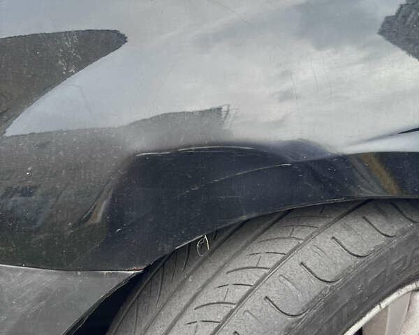 Черный Киа Черато, объемом двигателя 2 л и пробегом 220 тыс. км за 3400 $, фото 9 на Automoto.ua