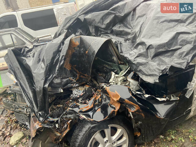 Черный Киа Черато, объемом двигателя 1.98 л и пробегом 95 тыс. км за 1650 $, фото 4 на Automoto.ua