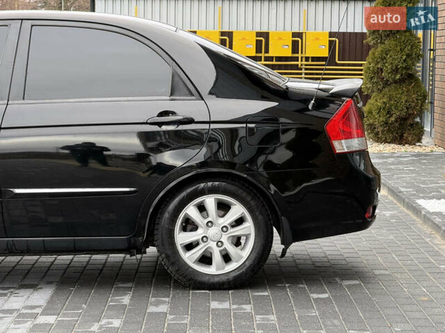 Черный Киа Черато, объемом двигателя 1.98 л и пробегом 180 тыс. км за 5500 $, фото 8 на Automoto.ua