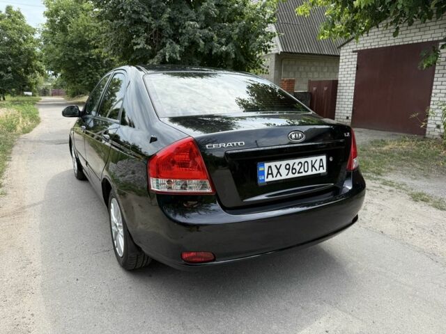 Чорний Кіа Черато, об'ємом двигуна 1.6 л та пробігом 180 тис. км за 4300 $, фото 8 на Automoto.ua