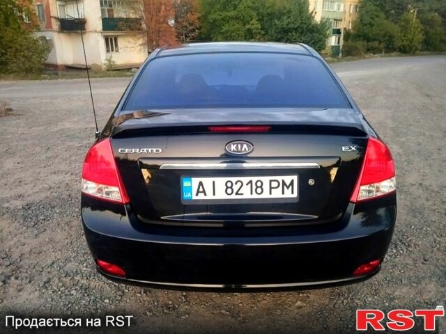 Черный Киа Черато, объемом двигателя 1.6 л и пробегом 272 тыс. км за 4700 $, фото 1 на Automoto.ua