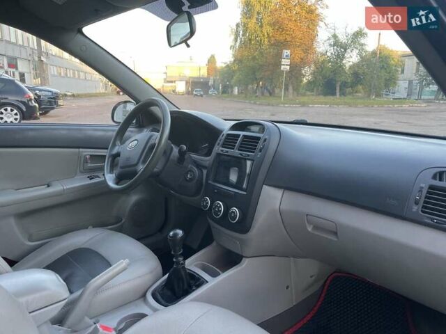 Чорний Кіа Черато, об'ємом двигуна 1.6 л та пробігом 299 тис. км за 4500 $, фото 20 на Automoto.ua
