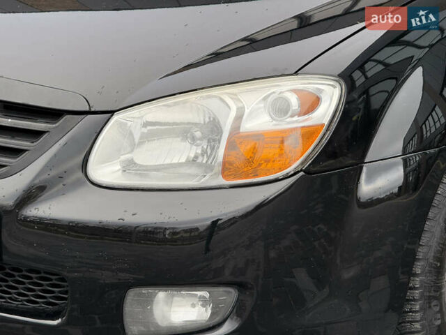 Черный Киа Черато, объемом двигателя 1.98 л и пробегом 180 тыс. км за 5500 $, фото 5 на Automoto.ua