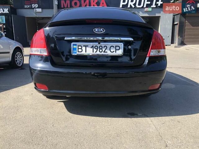 Чорний Кіа Черато, об'ємом двигуна 1.6 л та пробігом 260 тис. км за 4700 $, фото 7 на Automoto.ua