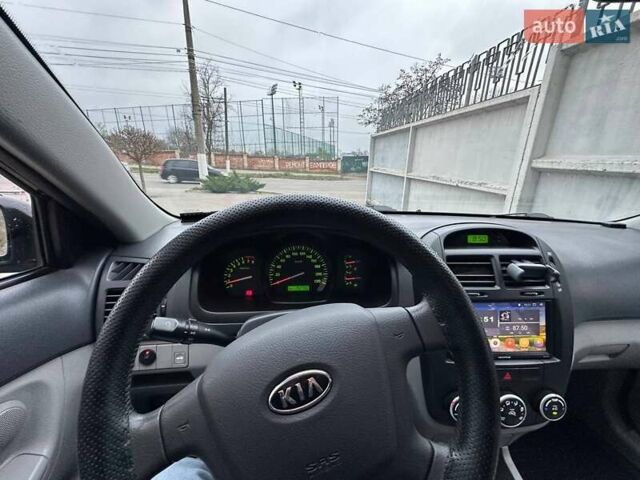 Чорний Кіа Черато, об'ємом двигуна 1.59 л та пробігом 192 тис. км за 4500 $, фото 1 на Automoto.ua