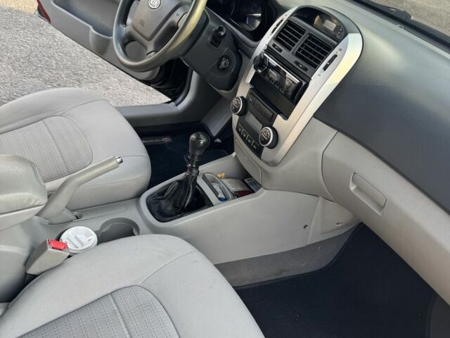 Черный Киа Черато, объемом двигателя 1.6 л и пробегом 156 тыс. км за 5500 $, фото 15 на Automoto.ua