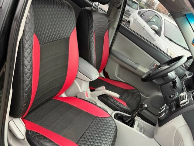 Черный Киа Черато, объемом двигателя 1.6 л и пробегом 258 тыс. км за 5200 $, фото 3 на Automoto.ua