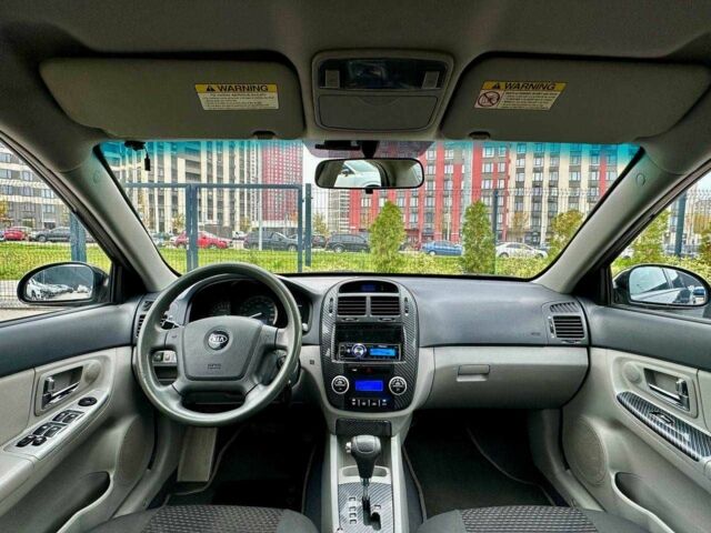 Чорний Кіа Черато, об'ємом двигуна 2 л та пробігом 270 тис. км за 4000 $, фото 8 на Automoto.ua