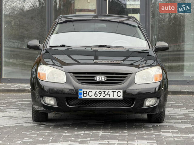 Черный Киа Черато, объемом двигателя 1.98 л и пробегом 180 тыс. км за 5500 $, фото 3 на Automoto.ua