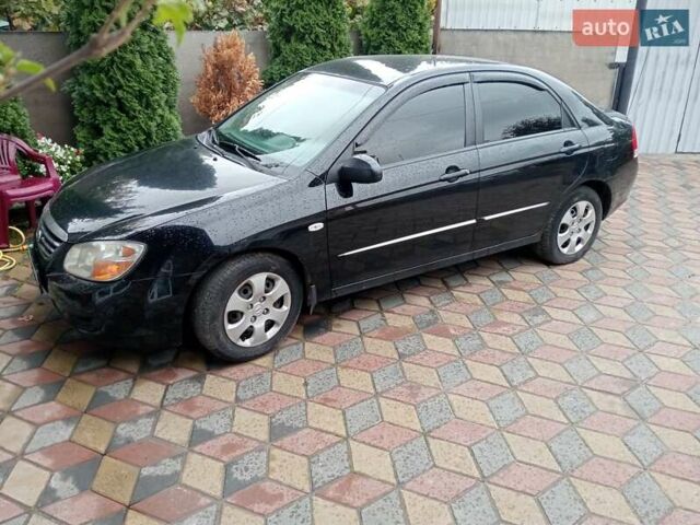 Черный Киа Черато, объемом двигателя 1.6 л и пробегом 260 тыс. км за 3800 $, фото 4 на Automoto.ua