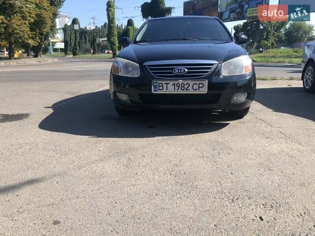 Чорний Кіа Черато, об'ємом двигуна 1.6 л та пробігом 260 тис. км за 4700 $, фото 2 на Automoto.ua