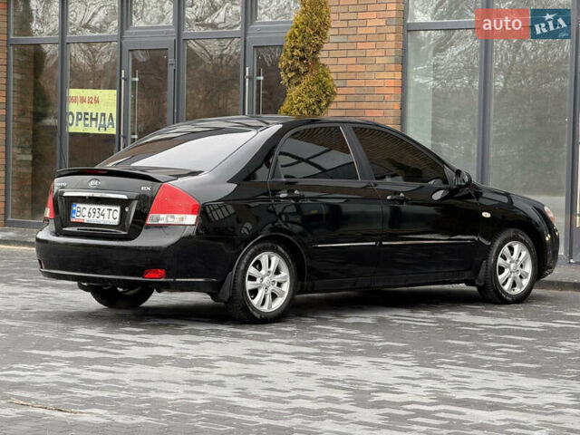 Черный Киа Черато, объемом двигателя 1.98 л и пробегом 180 тыс. км за 5500 $, фото 15 на Automoto.ua