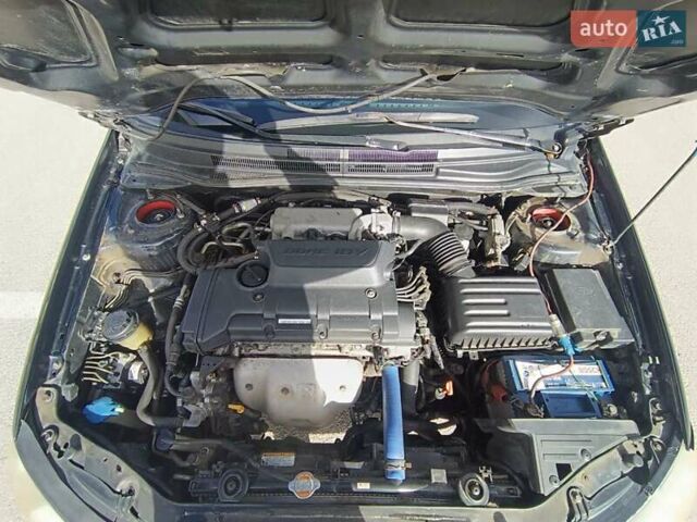 Черный Киа Черато, объемом двигателя 2 л и пробегом 298 тыс. км за 4250 $, фото 17 на Automoto.ua