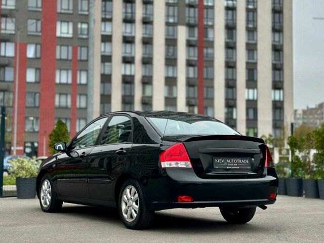 Чорний Кіа Черато, об'ємом двигуна 2 л та пробігом 270 тис. км за 4000 $, фото 6 на Automoto.ua
