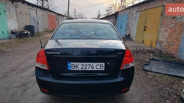 Чорний Кіа Черато, об'ємом двигуна 1.6 л та пробігом 185 тис. км за 4400 $, фото 2 на Automoto.ua