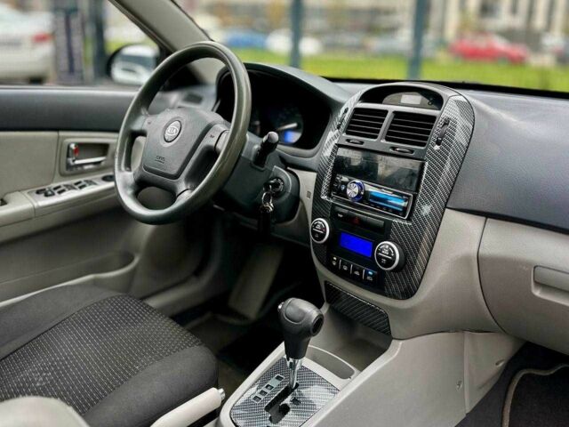 Чорний Кіа Черато, об'ємом двигуна 2 л та пробігом 270 тис. км за 4000 $, фото 14 на Automoto.ua