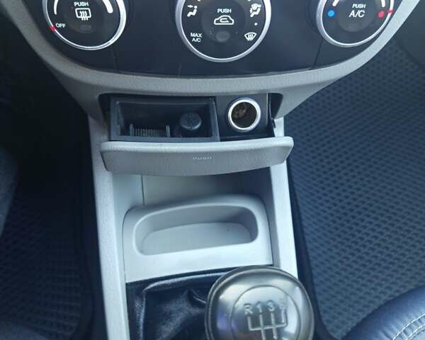 Чорний Кіа Черато, об'ємом двигуна 1.6 л та пробігом 232 тис. км за 4250 $, фото 23 на Automoto.ua