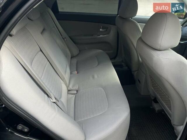 Черный Киа Черато, объемом двигателя 2 л и пробегом 173 тыс. км за 4800 $, фото 20 на Automoto.ua