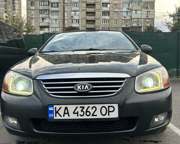 Черный Киа Черато, объемом двигателя 1.58 л и пробегом 350 тыс. км за 4500 $, фото 6 на Automoto.ua