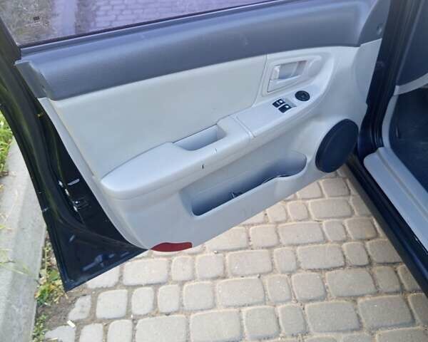 Чорний Кіа Черато, об'ємом двигуна 1.6 л та пробігом 232 тис. км за 4250 $, фото 13 на Automoto.ua