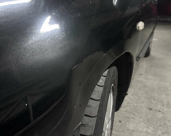 Киа Черато 2008 в Киеве на Automoto.ua Черный Киа Черато, объемом двигателя 2 л и пробегом 220 тыс. км за 3300 $, фото 20 на Automoto.ua