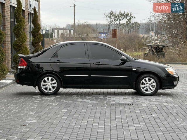 Черный Киа Черато, объемом двигателя 1.98 л и пробегом 180 тыс. км за 5500 $, фото 10 на Automoto.ua