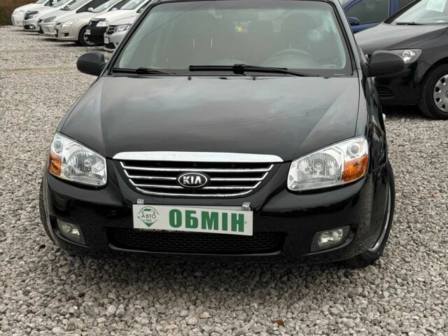 Черный Киа Черато, объемом двигателя 1.6 л и пробегом 258 тыс. км за 5200 $, фото 1 на Automoto.ua