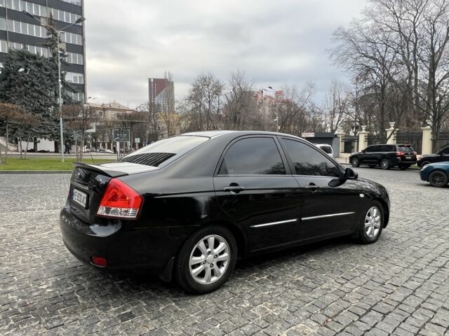 Чорний Кіа Черато, об'ємом двигуна 1.6 л та пробігом 300 тис. км за 4700 $, фото 5 на Automoto.ua