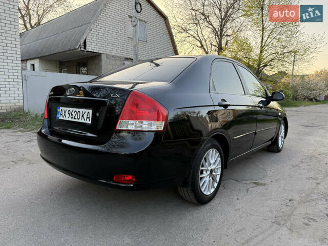 Черный Киа Черато, объемом двигателя 1.6 л и пробегом 190 тыс. км за 4300 $, фото 23 на Automoto.ua