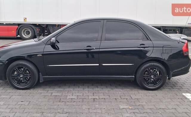 Кіа Черато 2008 у Кременчуге на Automoto.ua Чорний Кіа Черато, об'ємом двигуна 2 л та пробігом 193 тис. км за 5300 $, фото 6 на Automoto.ua