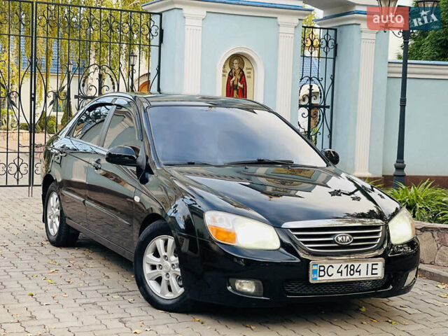 Черный Киа Черато, объемом двигателя 1.6 л и пробегом 167 тыс. км за 4950 $, фото 1 на Automoto.ua