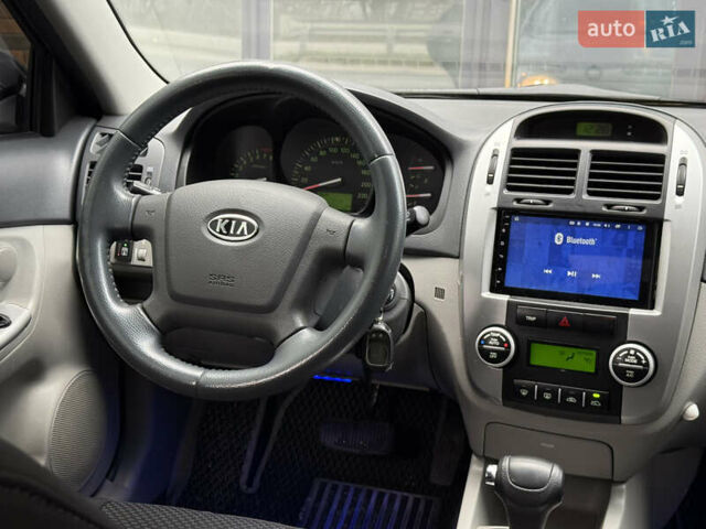 Черный Киа Черато, объемом двигателя 1.98 л и пробегом 180 тыс. км за 5500 $, фото 36 на Automoto.ua