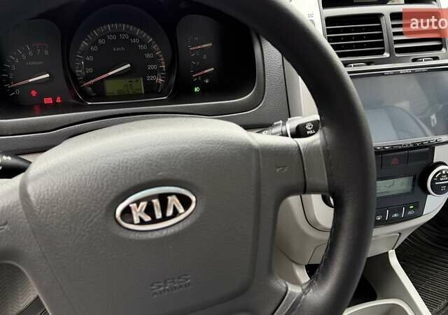 Черный Киа Черато, объемом двигателя 2 л и пробегом 186 тыс. км за 4999 $, фото 5 на Automoto.ua