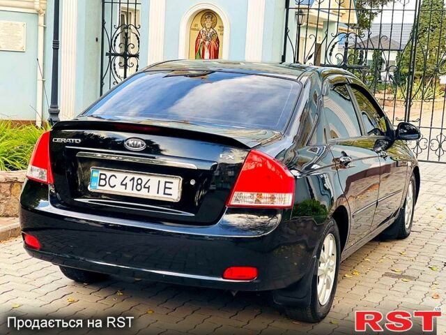 Черный Киа Черато, объемом двигателя 1.6 л и пробегом 167 тыс. км за 3950 $, фото 2 на Automoto.ua