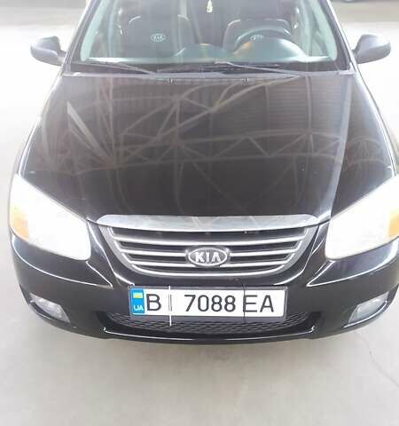 Черный Киа Черато, объемом двигателя 1.6 л и пробегом 188 тыс. км за 5200 $, фото 13 на Automoto.ua