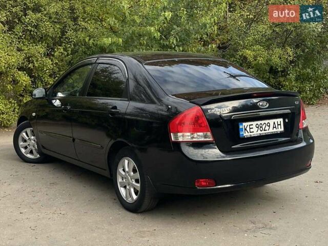 Черный Киа Черато, объемом двигателя 2 л и пробегом 173 тыс. км за 4800 $, фото 5 на Automoto.ua