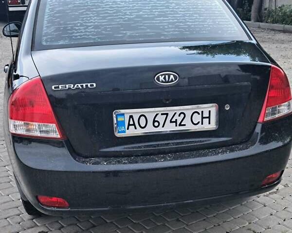 Черный Киа Черато, объемом двигателя 1.6 л и пробегом 185 тыс. км за 4000 $, фото 3 на Automoto.ua