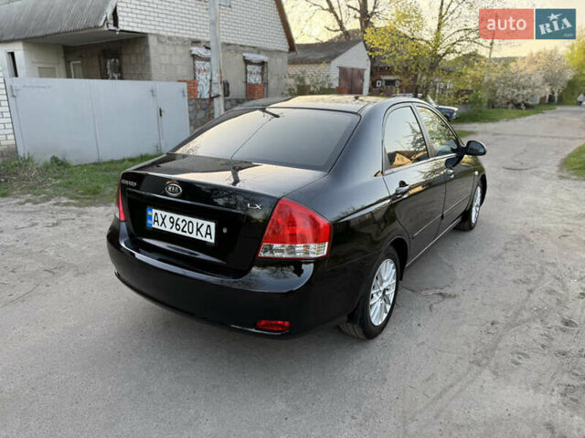 Черный Киа Черато, объемом двигателя 1.6 л и пробегом 190 тыс. км за 4300 $, фото 10 на Automoto.ua