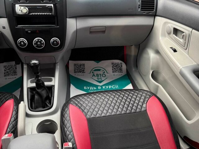 Черный Киа Черато, объемом двигателя 1.6 л и пробегом 258 тыс. км за 5200 $, фото 14 на Automoto.ua