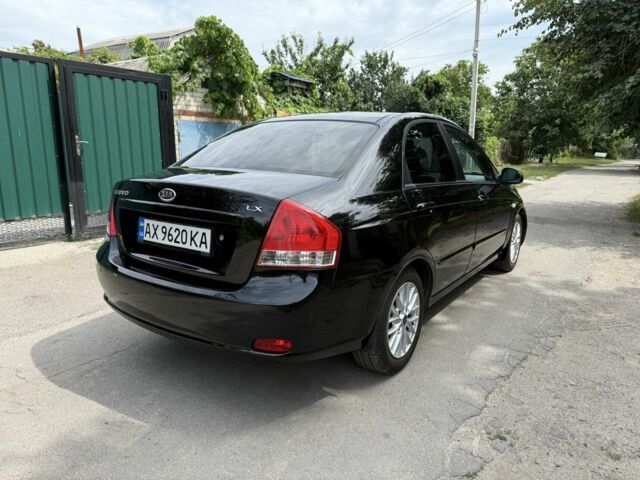 Чорний Кіа Черато, об'ємом двигуна 1.6 л та пробігом 180 тис. км за 4300 $, фото 5 на Automoto.ua