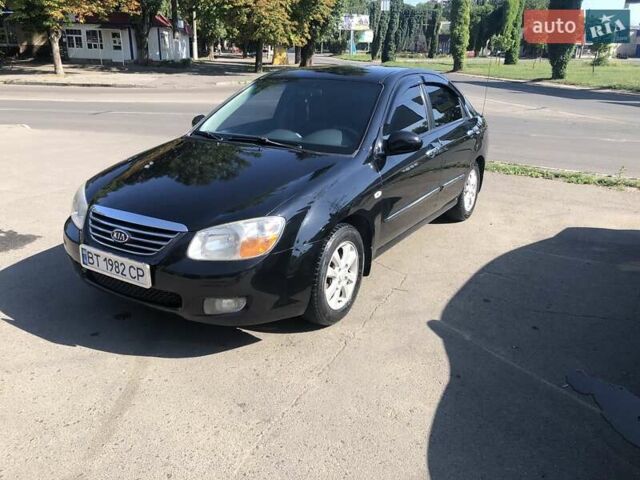 Чорний Кіа Черато, об'ємом двигуна 1.6 л та пробігом 260 тис. км за 4700 $, фото 1 на Automoto.ua