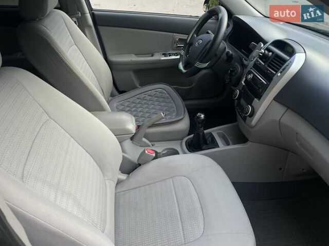 Черный Киа Черато, объемом двигателя 2 л и пробегом 173 тыс. км за 4800 $, фото 19 на Automoto.ua