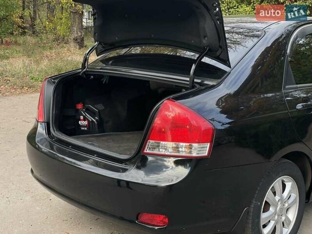 Черный Киа Черато, объемом двигателя 2 л и пробегом 173 тыс. км за 4800 $, фото 11 на Automoto.ua