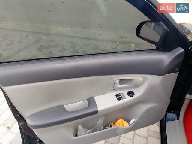 Чорний Кіа Черато, об'ємом двигуна 1.6 л та пробігом 335 тис. км за 5500 $, фото 9 на Automoto.ua